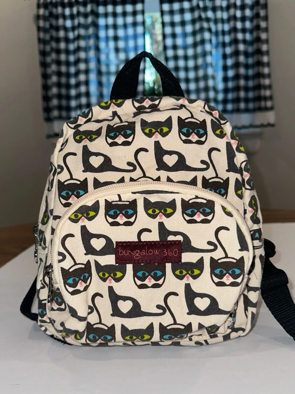 bungalow 360 Cream Mini Backpack with Black Cat Print and Colorful Eyes
